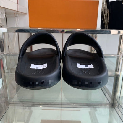 Monogram Embossed Rubber Slide Sandals
