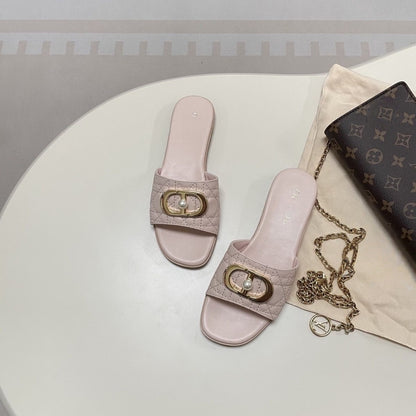 Quilted Leather Slide Sandals with Metal Buckle and Pearl Detail