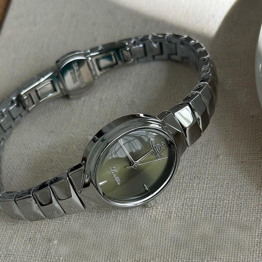 【#A296】Women's Small Oval Dial Saturn Logo Steel Band Watch, Luxury Narrow Wrist Watch Gift for Her