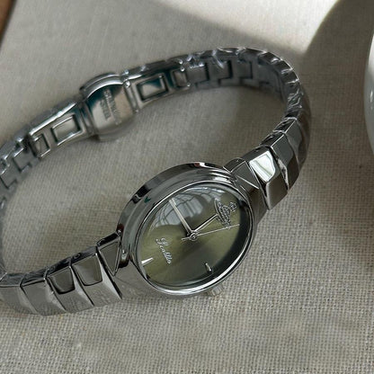 【#A296】Women's Small Oval Dial Saturn Logo Steel Band Watch, Luxury Narrow Wrist Watch Gift for Her