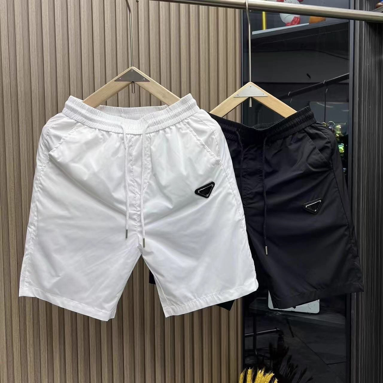 【#A574】Men's Triangle Logo Ice Silk Quick Dry Five-Point Shorts Loose Versatile Casual Beach Shorts