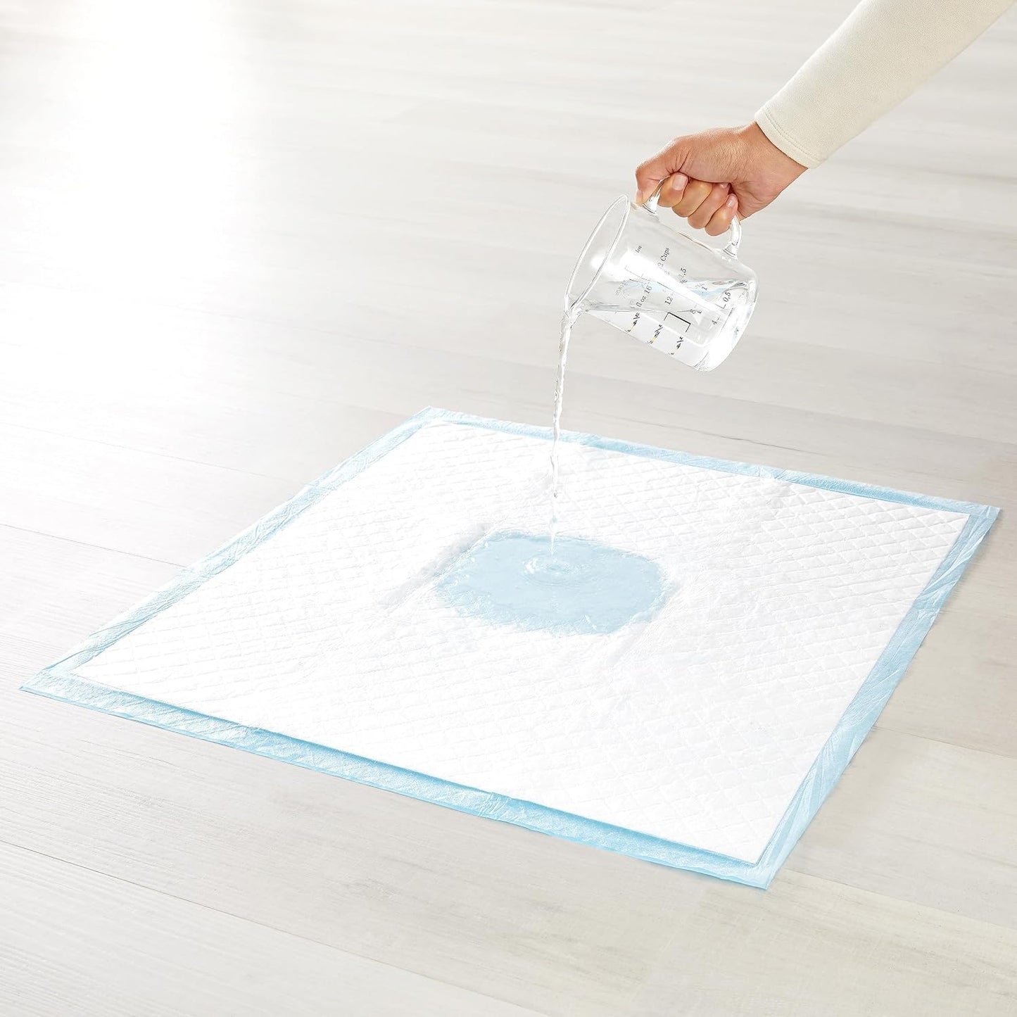 HOTAmazon Basics Heavy Duty Dog and Puppy Pee Pads, Leak-Proof 5-Layer Super Absorbent, Quick-Dry Surface for Potty Training, Regular Size, 24x23", Blue & White, 50 Count
